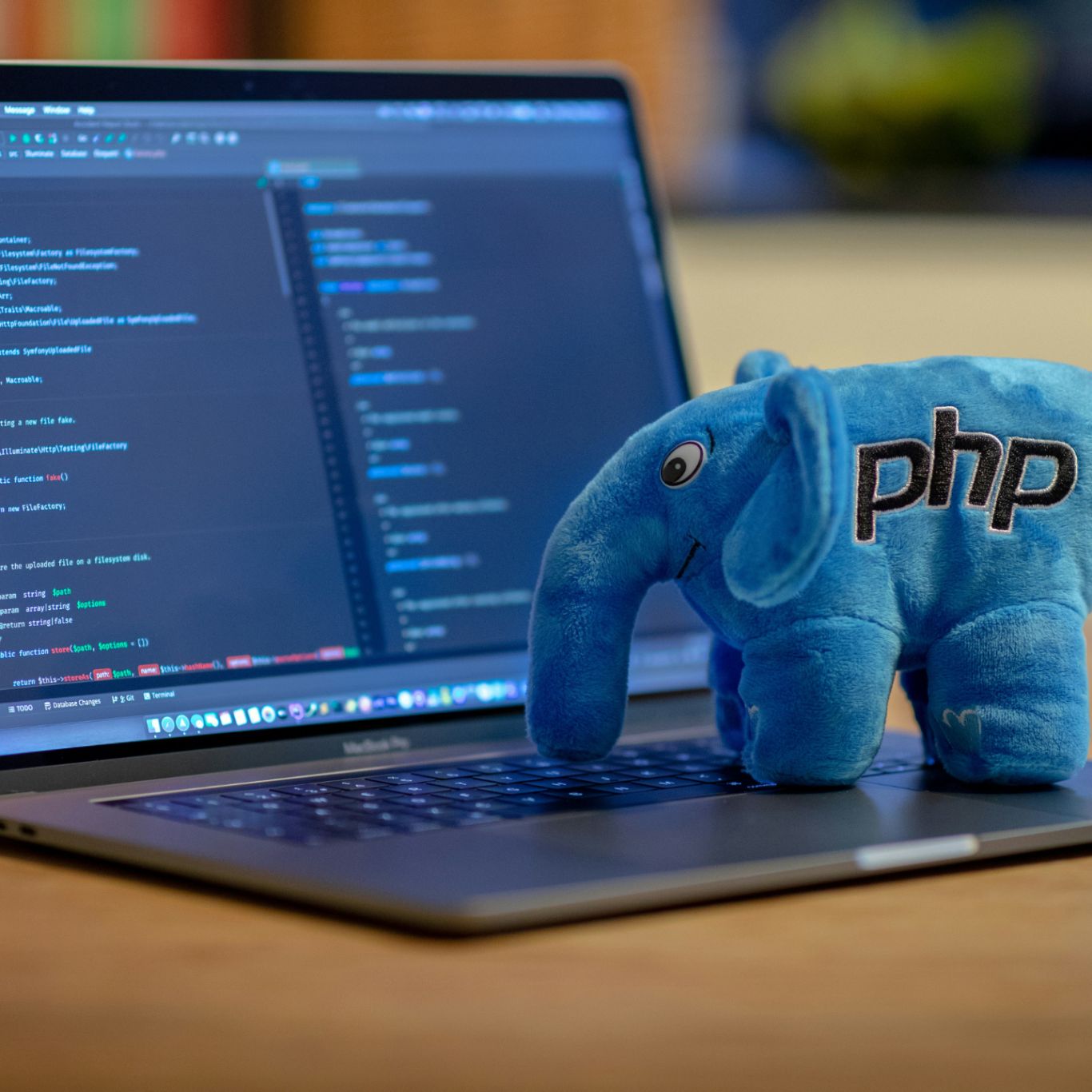 PHP developers elephant on laptop